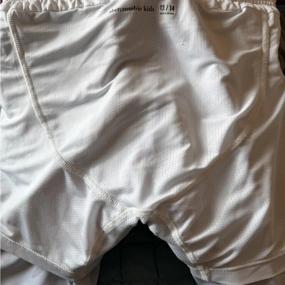 Abercombie kids shark print swim trunks.